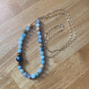 tahitian pearl necklace with gem stones on gold chain